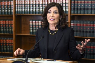 FILE - New York Gov. Kathy Hochul speaks to reporters about end of session legislative bills and a swearing-in ceremony, June 7, 2023, in Albany, N.Y. Hochul is not trying to create "quarantine camps." Critics are misrepresenting a temporary rule adopted during the COVID-19 pandemic that outlines powers by state health officials to isolate or quarantine people for the purpose of controlling a highly transmissible disease. (AP Photo/Hans Pennink, File)