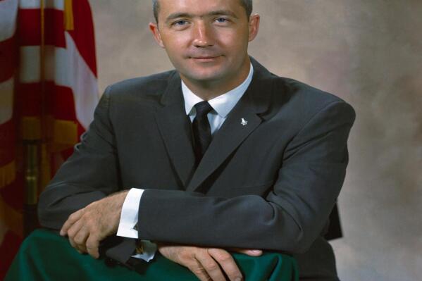 In this undated photo provided by NASA, astronaut James A. McDivitt poses for a picture. McDivitt, who commanded the Apollo 9 mission testing the first complete set of equipment to go to the moon, died Thursday, Oct. 13, 2022. He was 93. (NASA via AP)