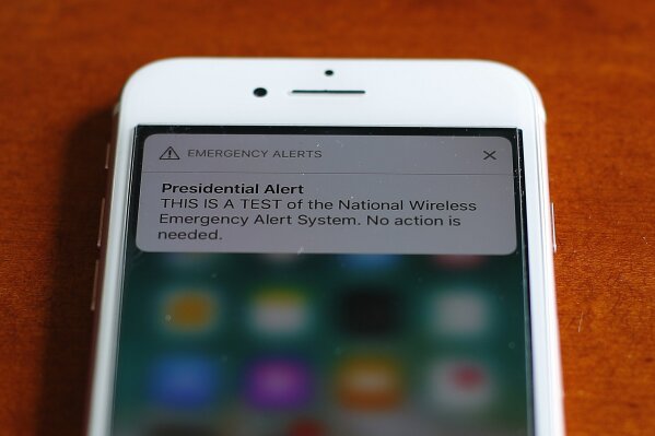 
              The first test of the national wireless emergency system by the Federal Emergency Management Agency is shown on a cellular phone in Detroit, Wednesday, Oct. 3, 2018. About 225 millio...