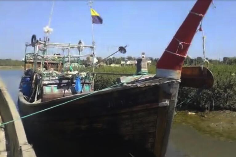 This image from video provided by Ro Mohammed Zowlal Ryz shows the boat of Jamal Hussein, who was captaining the vessel when it sank in rough seas south of Bangladesh on Dec. 7, 2022, carrying around 180 Rohingya refugees. Hussein shot the video and shared it with prospective passengers around Bangladesh's Rohingya refugee camps. (Jamal Hussein via AP)